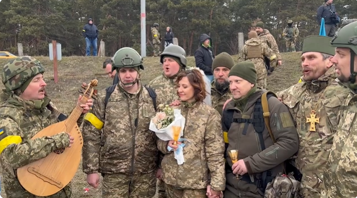 Watch: Ukrainian Couple Marry At Frontline In Kyiv As Other Soldiers Sing For Them